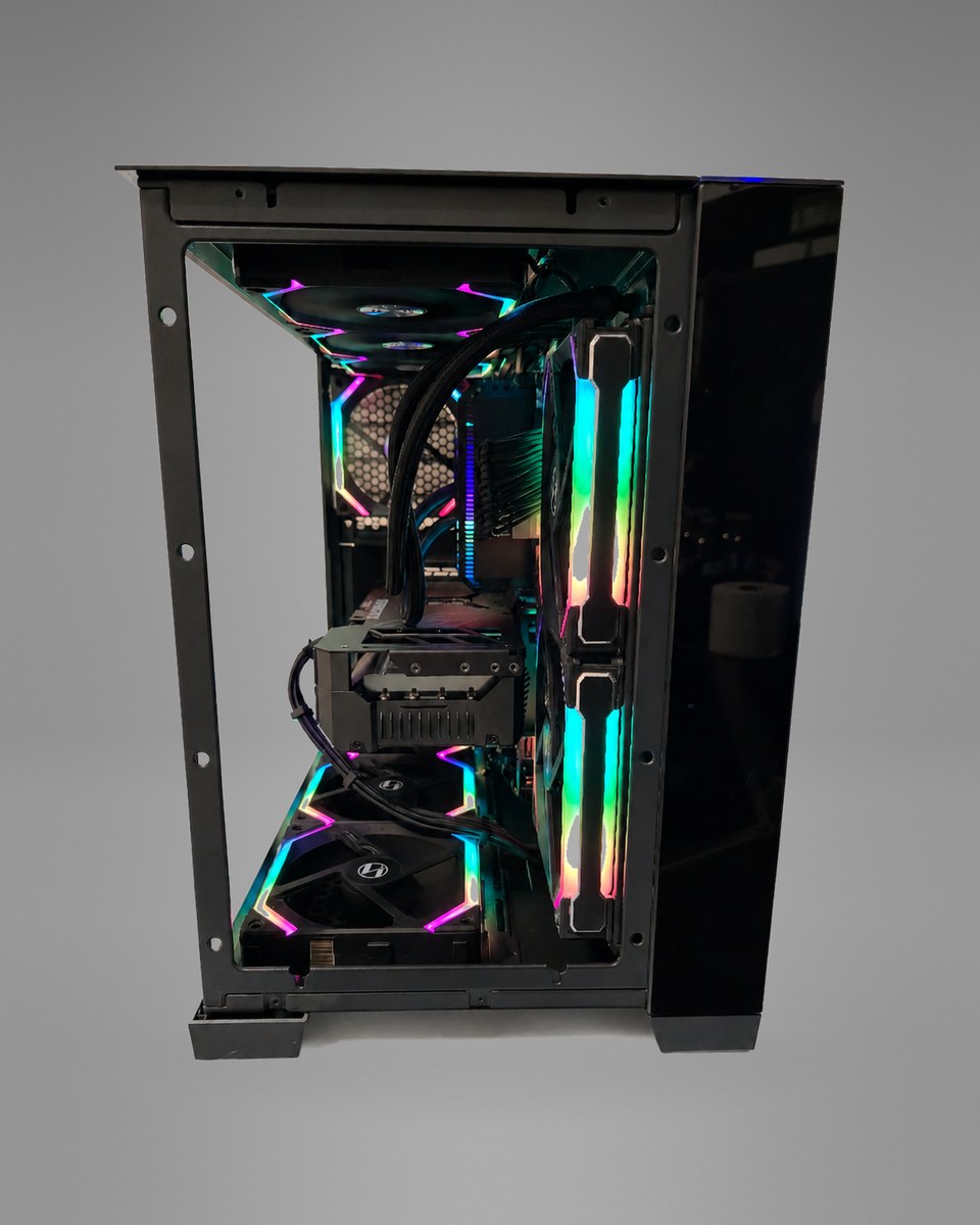 View through the front glass of Blackprism 004 showing the power supply, cooler tubing and lit fan strips.