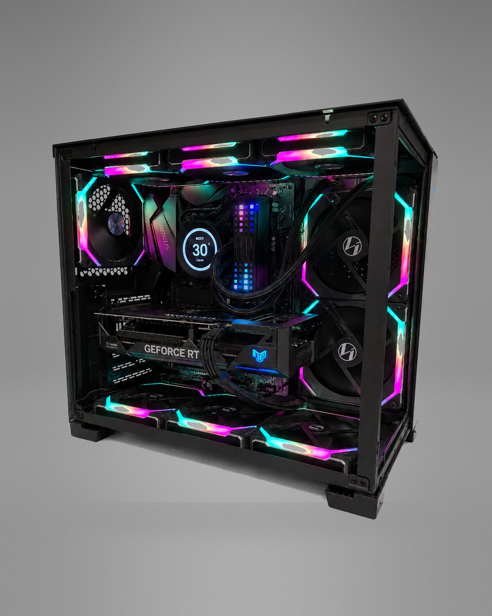 Front three-quarter view of Blackprism 004 with both glass panels showing the liquid cooler, graphics card and spectrum-lit fans.