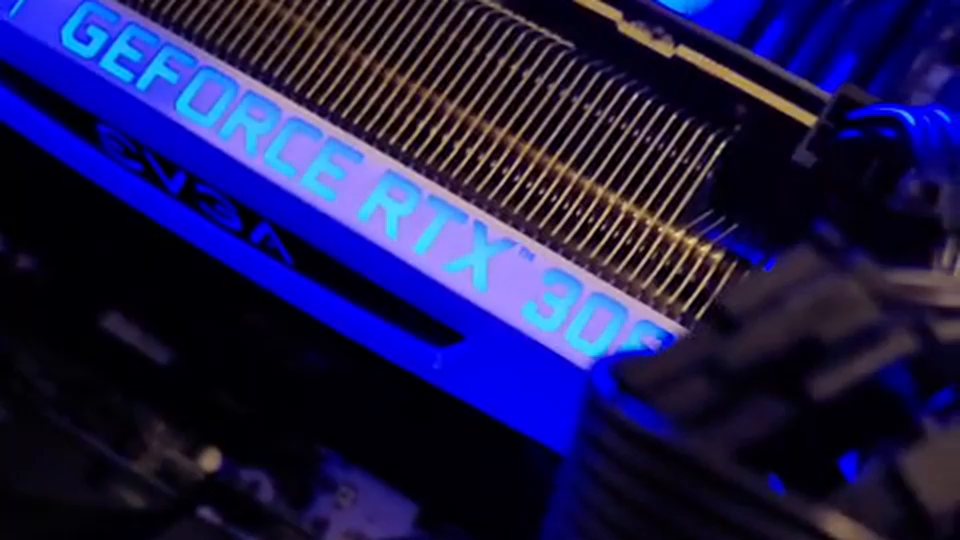 Snowlight 002 interior, showing the graphics card and braided cabling under blue lighting